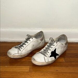 GOLDEN GOOSE SUPERSTARS Size EU 39- black, white, and holographic.